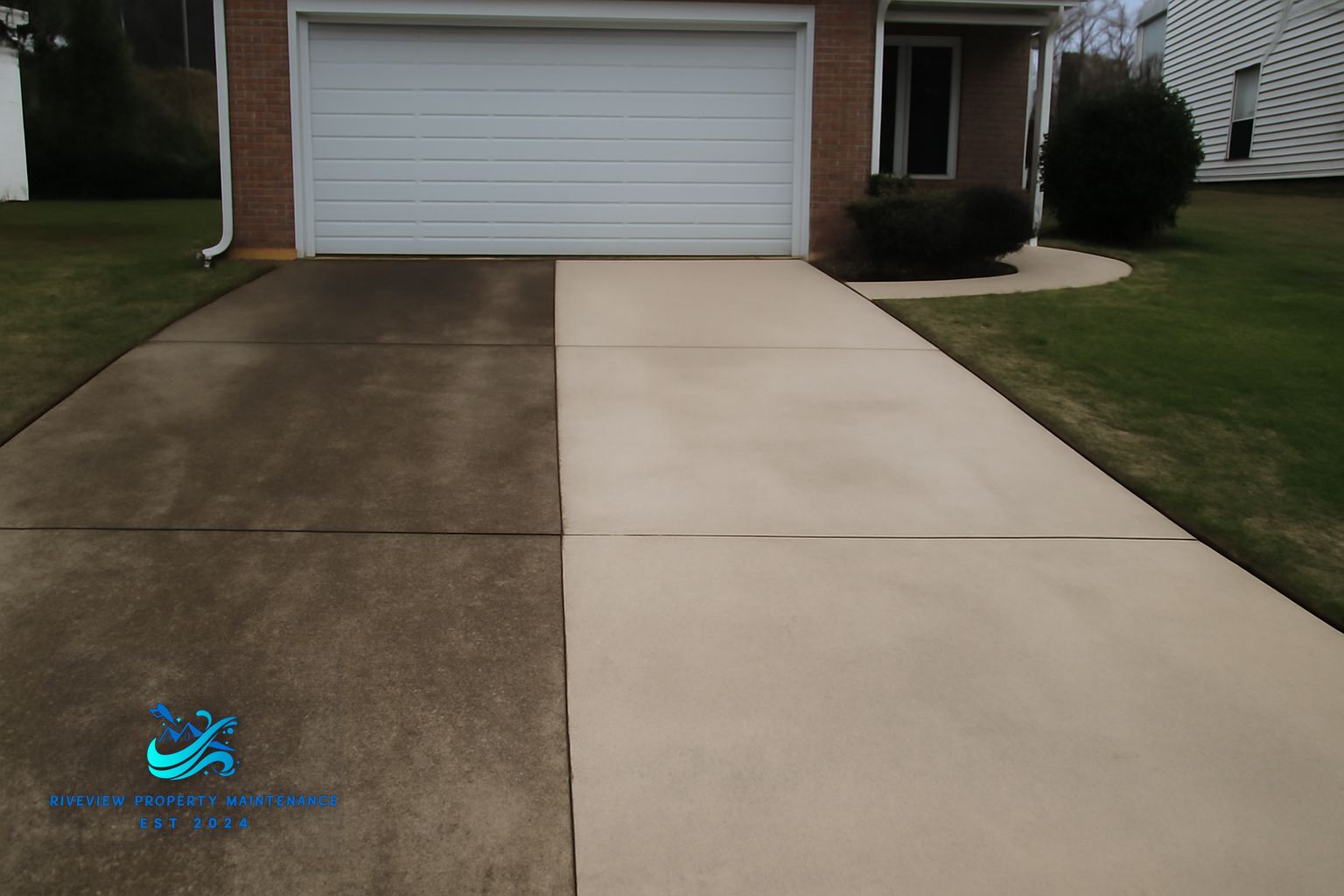 Concrete driveway in Buford GA being cleaned by professional pressure washing equipment