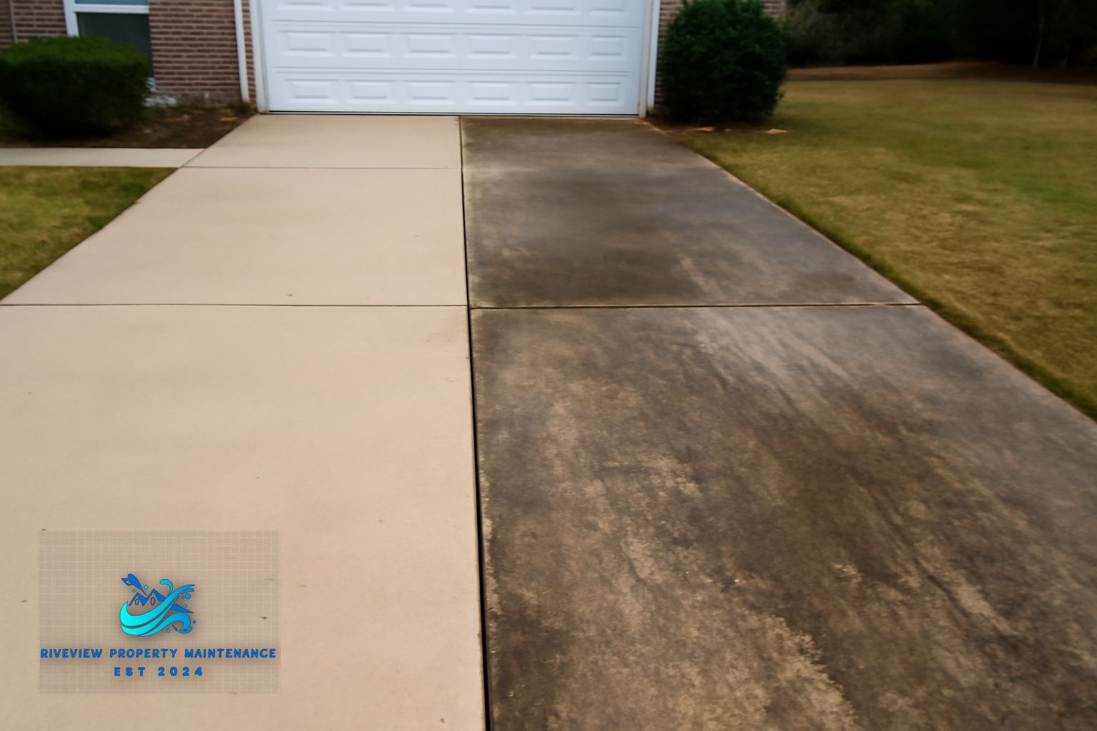 Clean residential concrete driveway after professional pressure washing service in Dacula Georgia