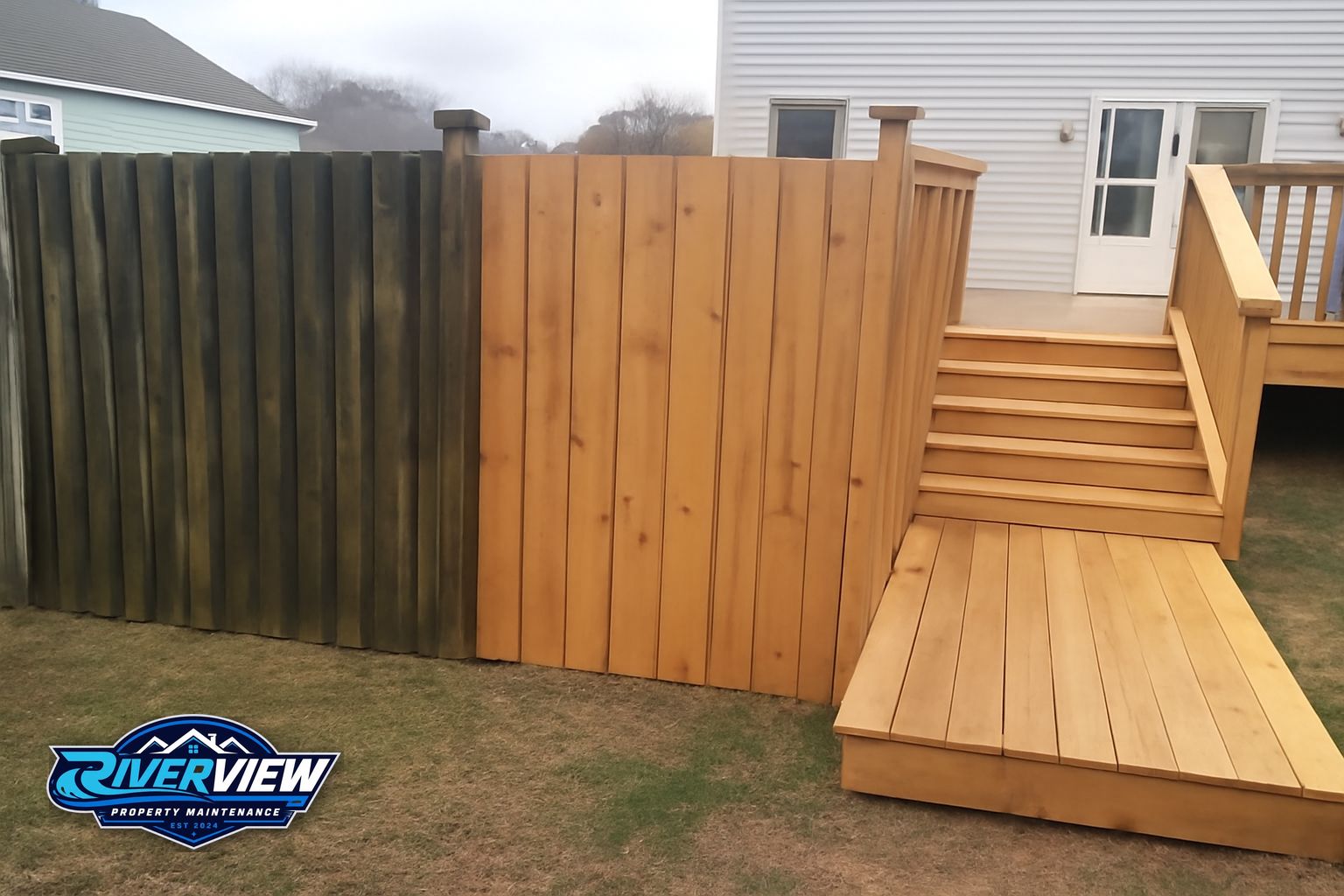 Gray weathered deck boards with mildew staining before soft washing in Mulberry GA