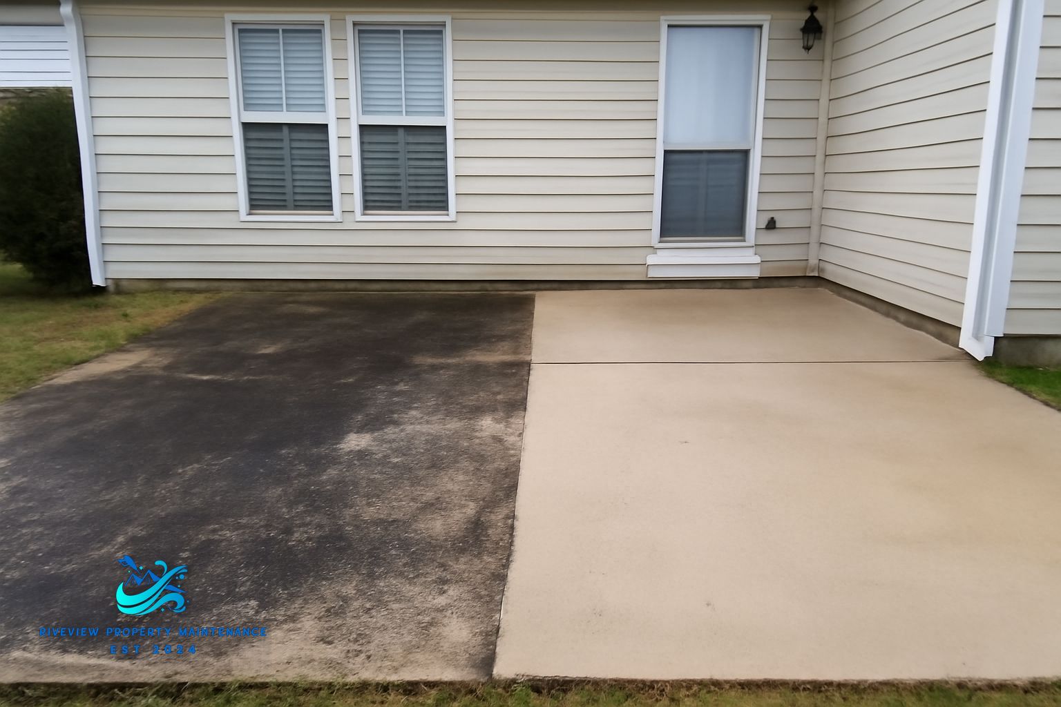 Pressure washing red clay and algae from a concrete patio in Lawrenceville, GA