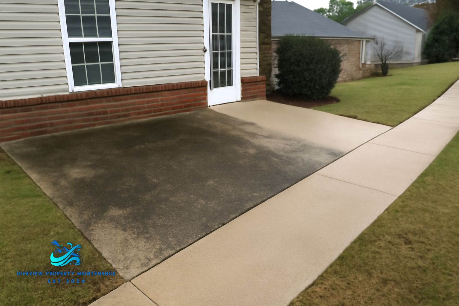 Pressure washed patio showing clean concrete after professional service in Lawrenceville, GA