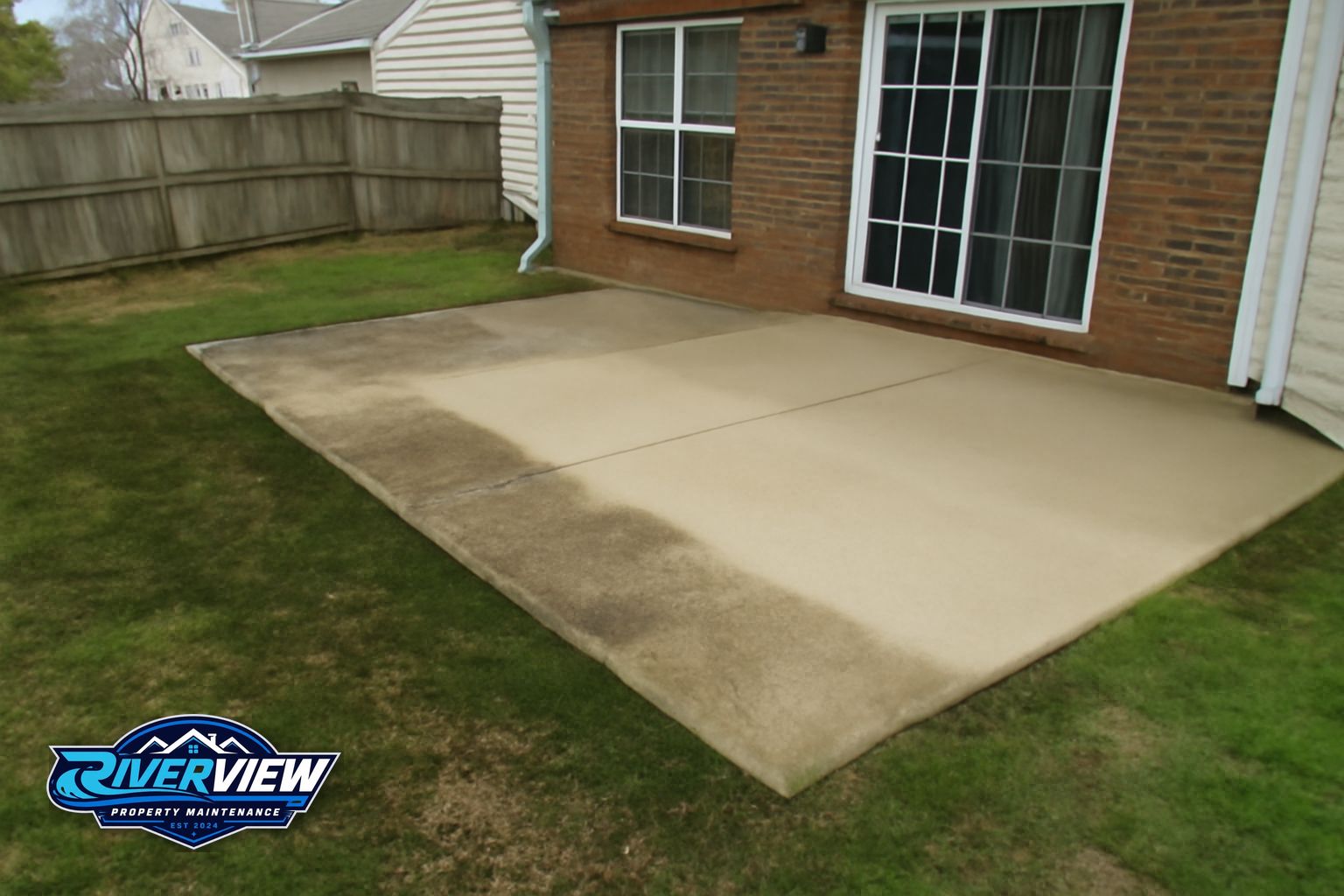 Clean concrete patio and sidewalk after professional pressure washing in Lawrenceville GA