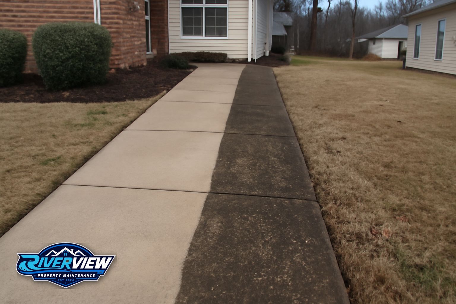 Clean commercial sidewalk in Winder Georgia after pressure washing by Riverview Property Maintenance
