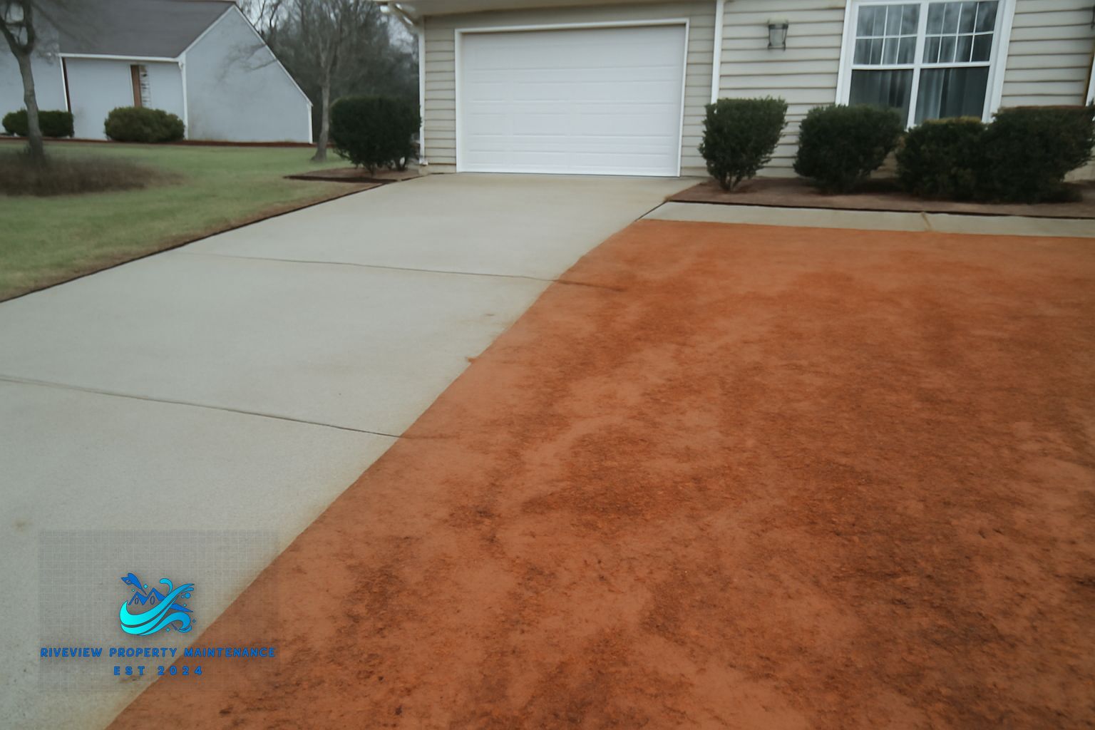 Riverview Property Maintenance crew cleaning driveway and sidewalk in Barrow County Georgia
