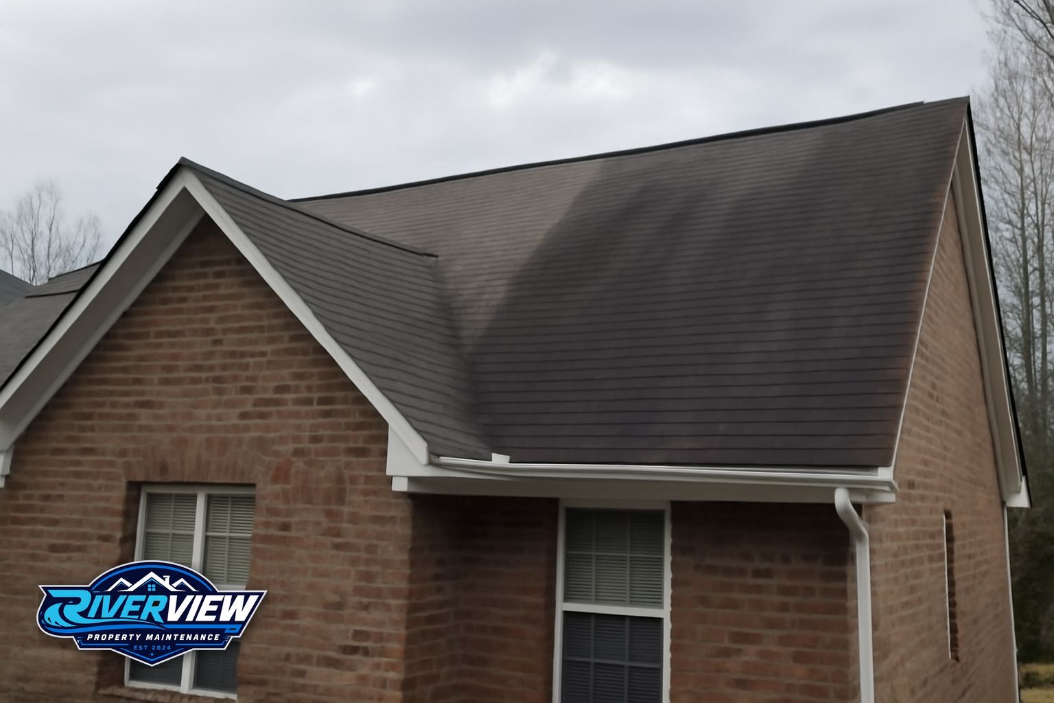 Clean asphalt shingle roof after professional soft washing in Winder Georgia with no black streaks visible