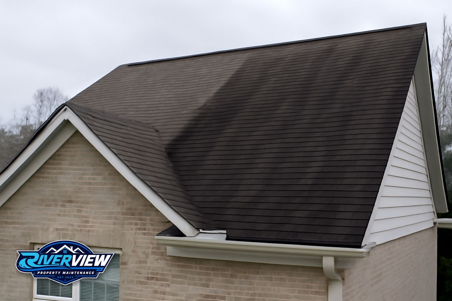 Clean roof on a Buford Georgia home after Riverview soft washing treatment