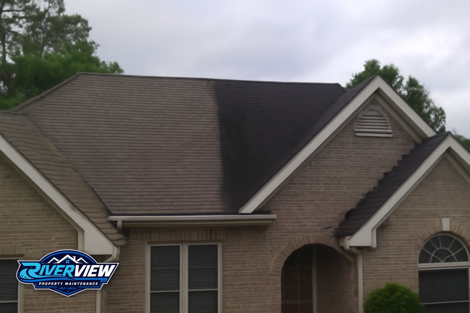 Clean roof on a Dacula Georgia home after soft washing treatment removes black streaks and algae