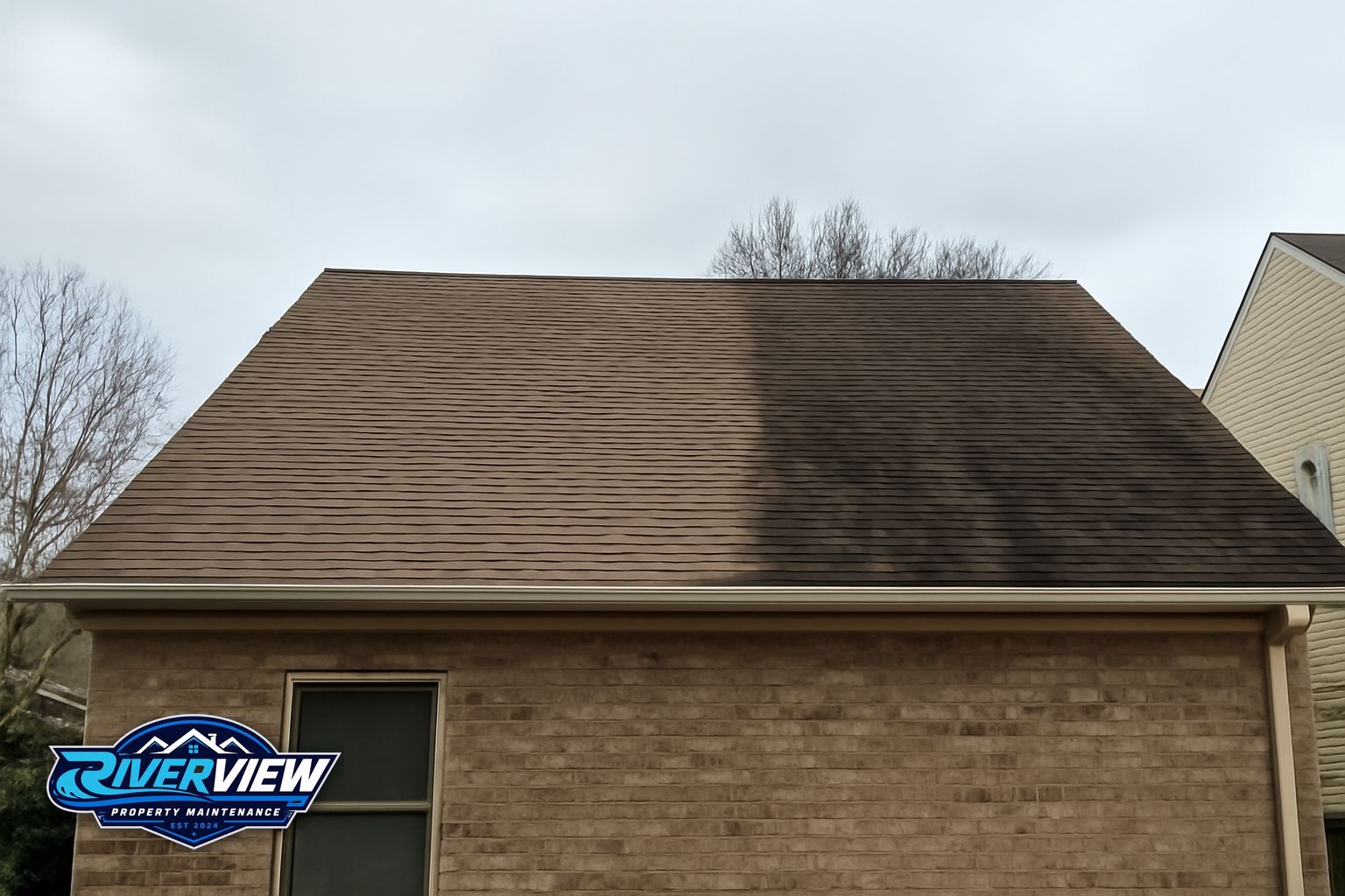 Clean asphalt shingle roof after soft washing on a Grayson Georgia home