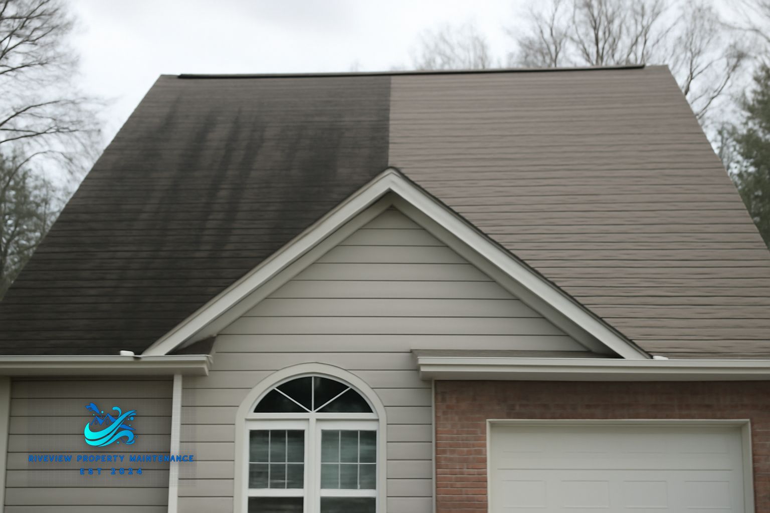 Dark algae streaks on an asphalt shingle roof in Lawrenceville, GA before soft washing treatment