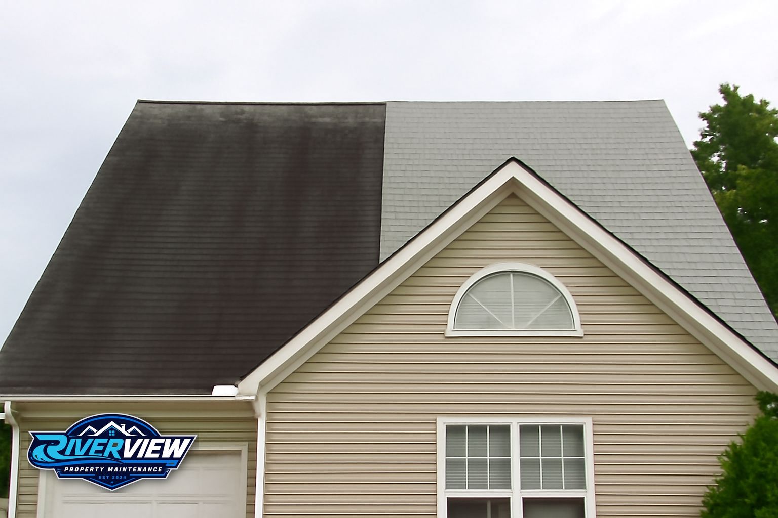 Black algae streaks on an asphalt shingle roof in a Lawrenceville, GA neighborhood