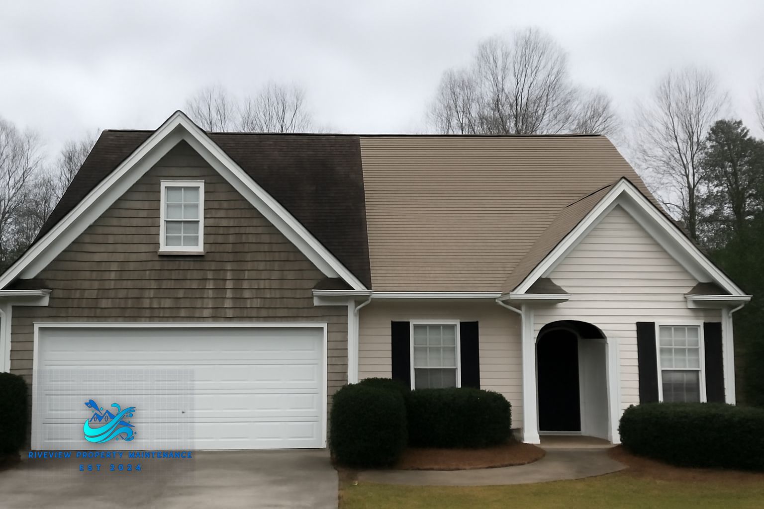 Dark algae streaks on asphalt shingles on a Lawrenceville Georgia home before soft washing treatment