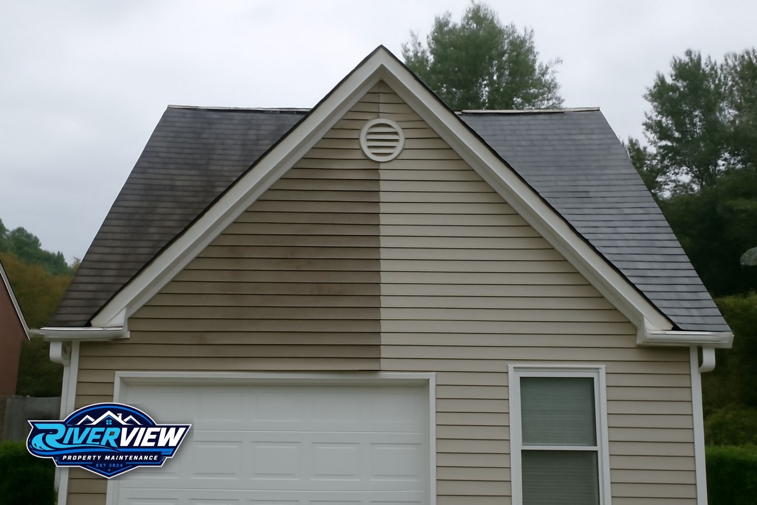 Black algae streaks on asphalt shingle roof in Lawrenceville GA neighborhood
