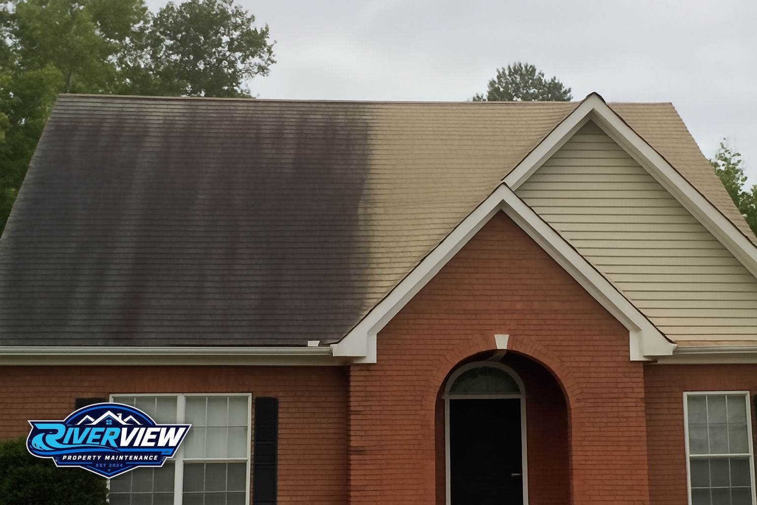 Black algae streaks on asphalt shingles in Lawrenceville GA before soft washing