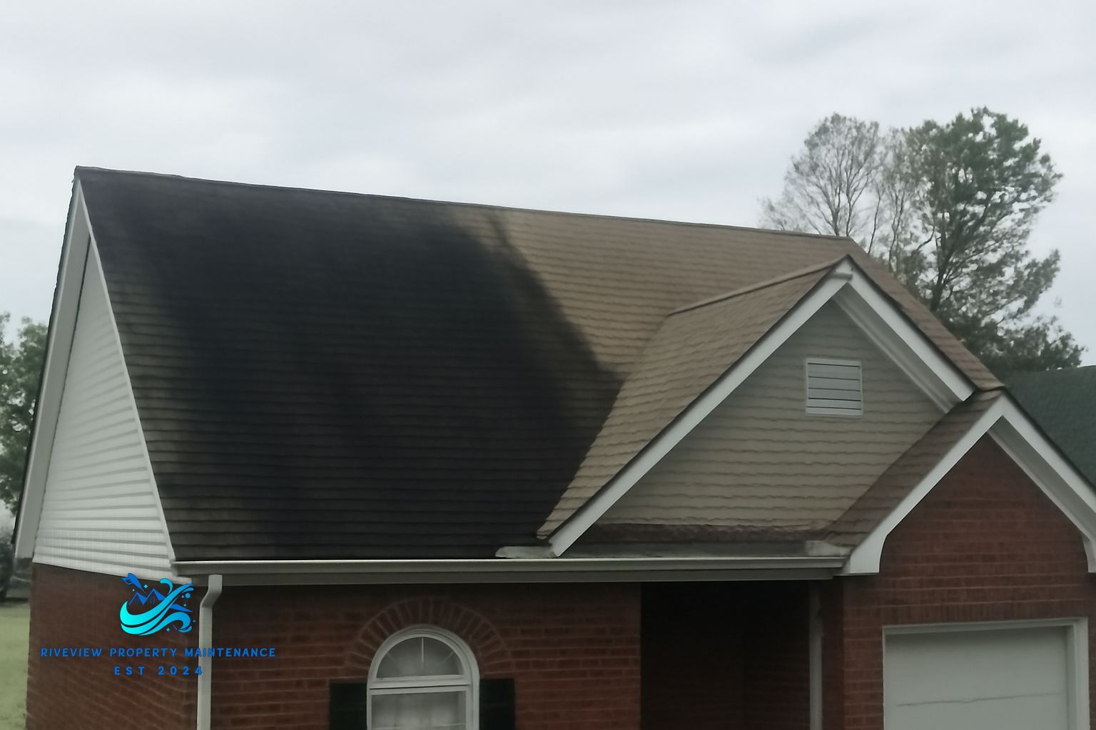 Before and after roof soft washing on a shingle roof in Lawrenceville, Georgia showing black streak removal