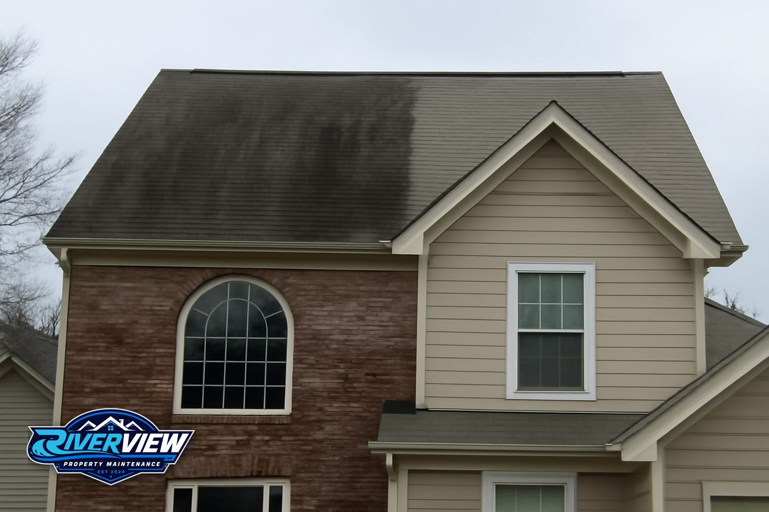 Black algae streaks on asphalt shingles in Lawrenceville GA before soft washing