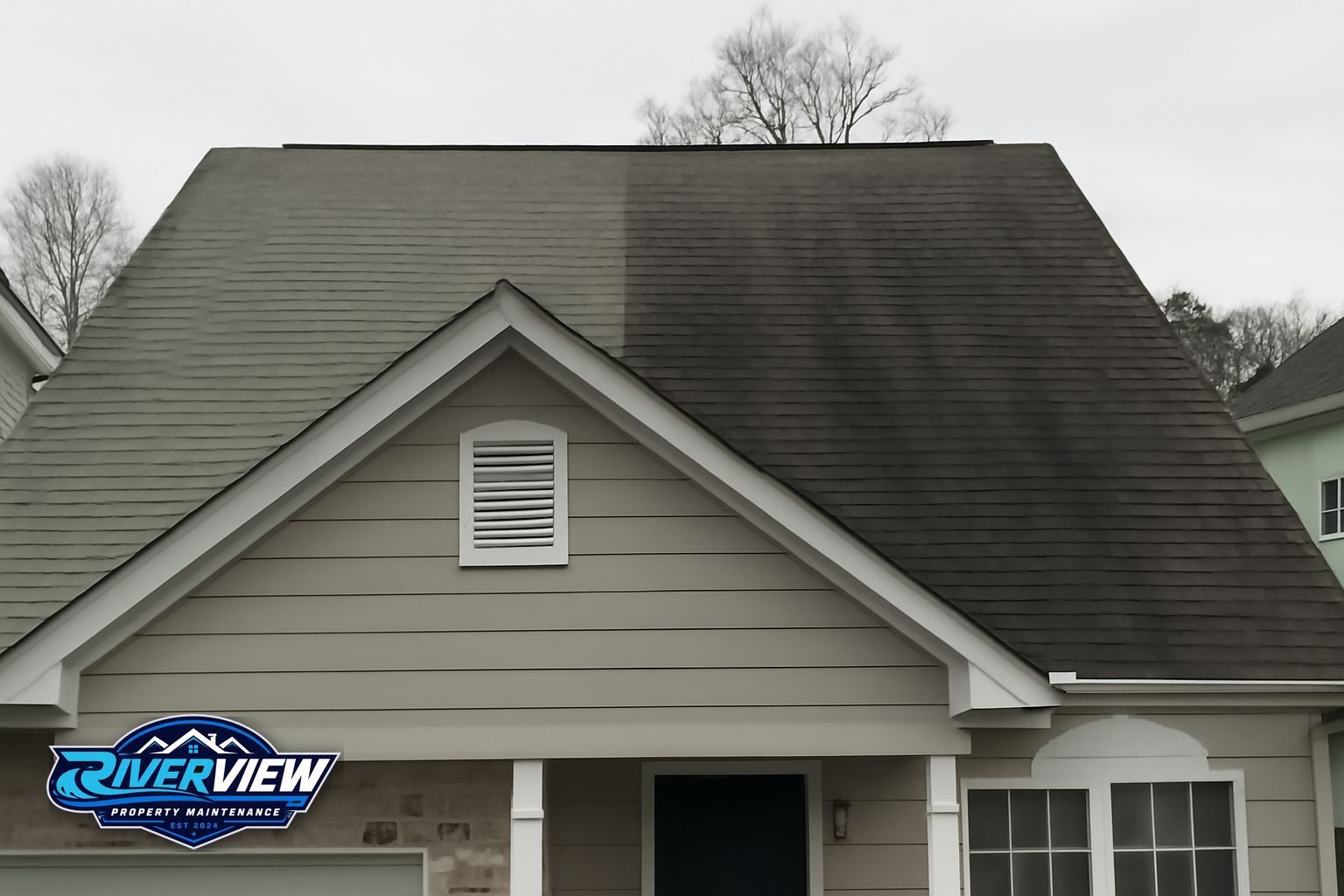 Clean residential roof after soft washing in Lawrenceville, Georgia showing restored shingle color