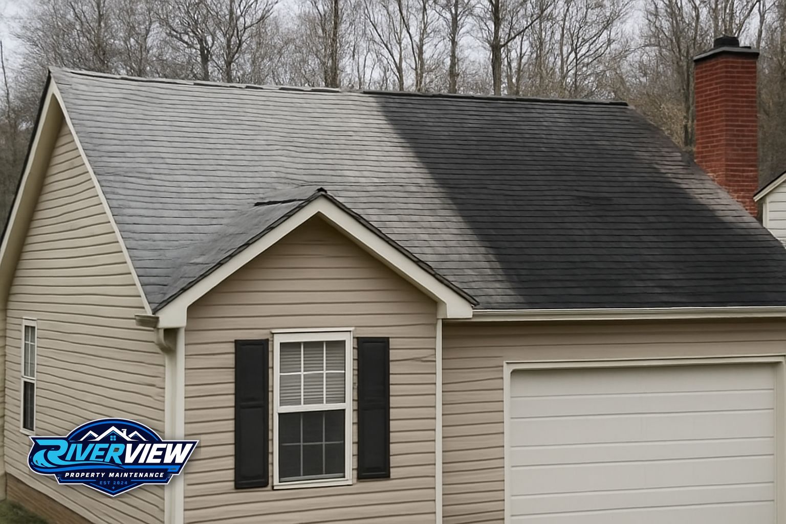 Clean roof and freshly pressure-washed driveway on a home in Loganville Georgia after Riverview Property Maintenance service