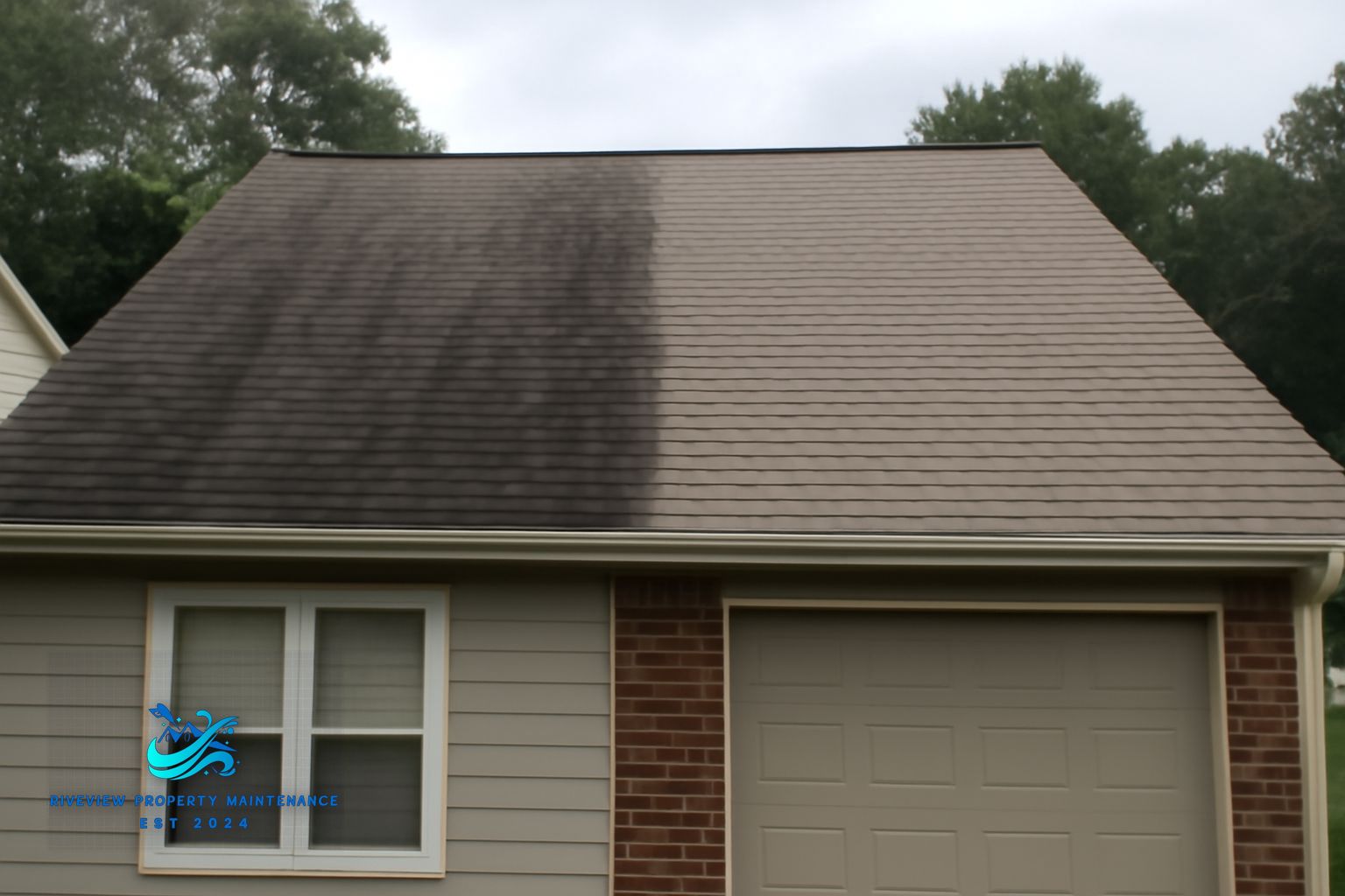 Riverview Property Maintenance technician applying soft wash solution to a residential roof in Barrow County Georgia