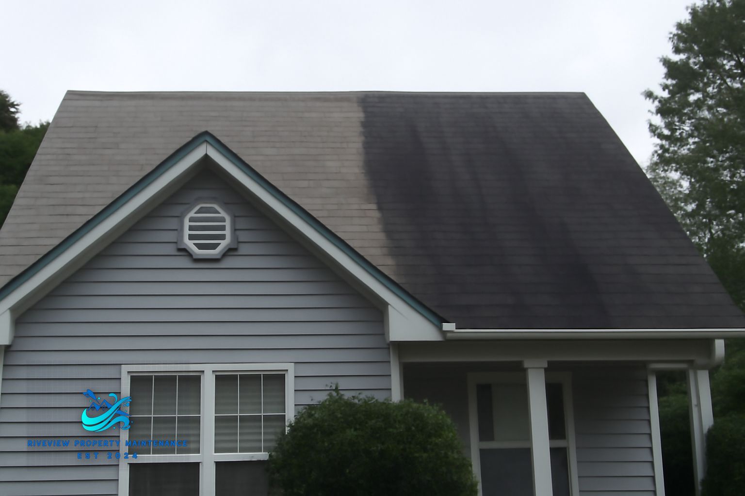 Clean asphalt shingle roof and freshly soft-washed vinyl siding on a Barrow County Georgia home after Riverview treatment