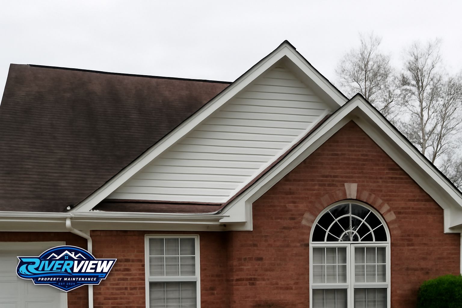 Black algae streaks on asphalt shingles on a Winder, GA home